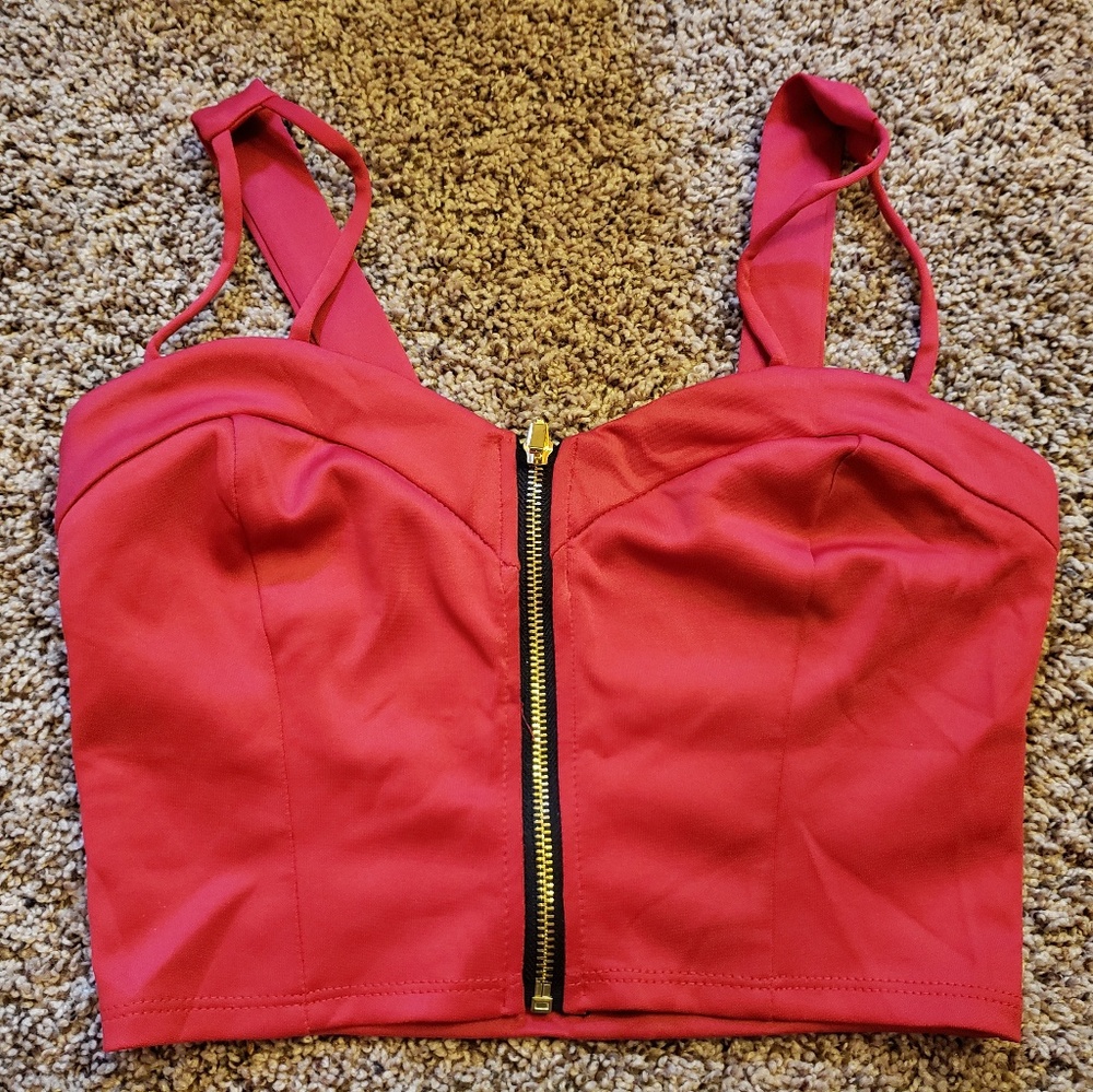 Red zip up top
